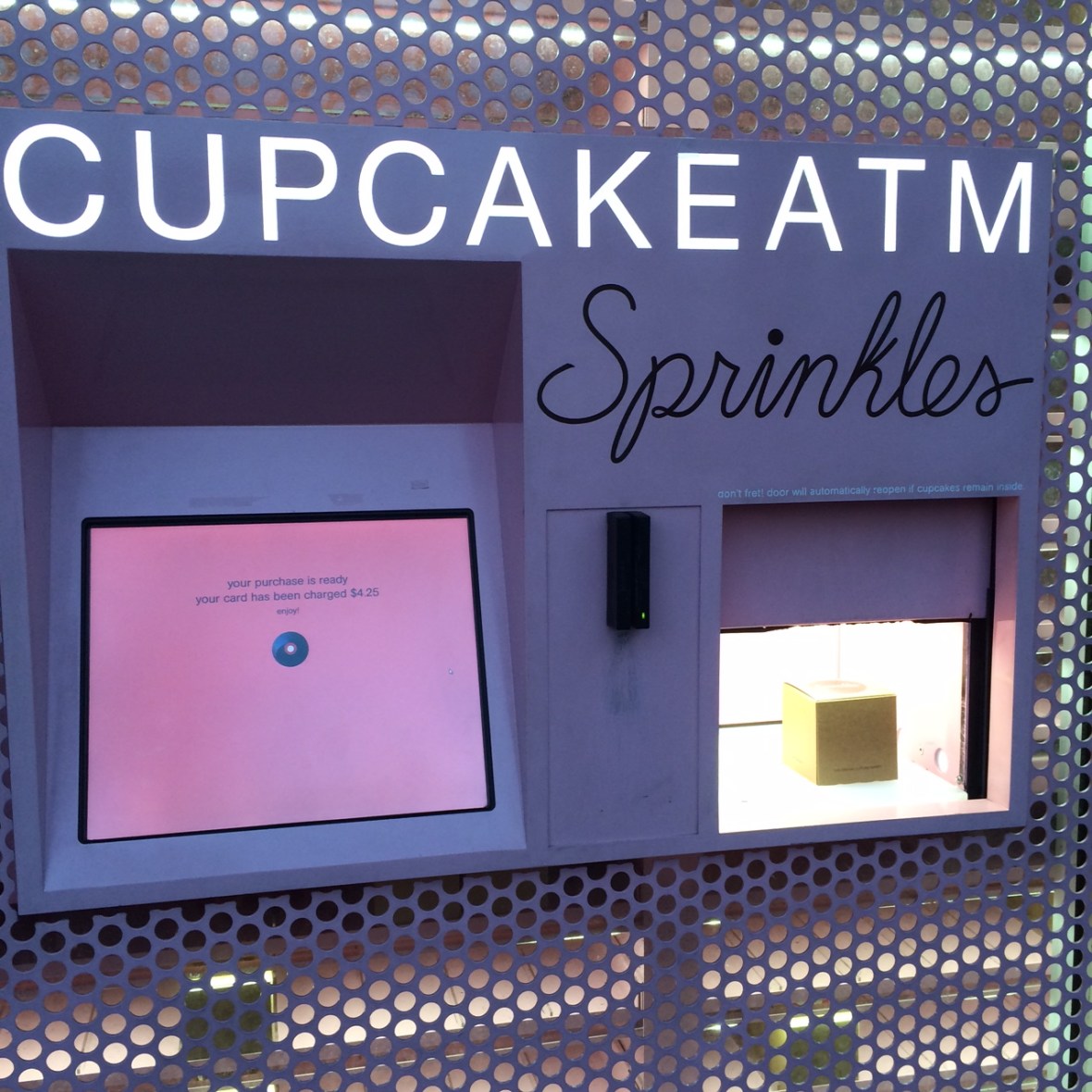 The door magically opens, and the cupcake appears! 