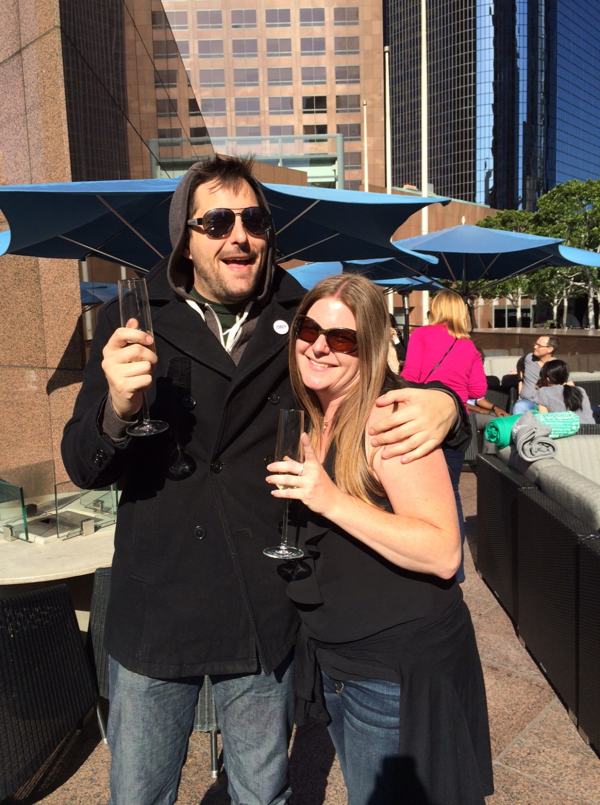 Can you tell which person lives in Cleveland (hint: the one in the tank top) and which person lives in LA (hint: the one in the hoodie and the wool peacoat)?