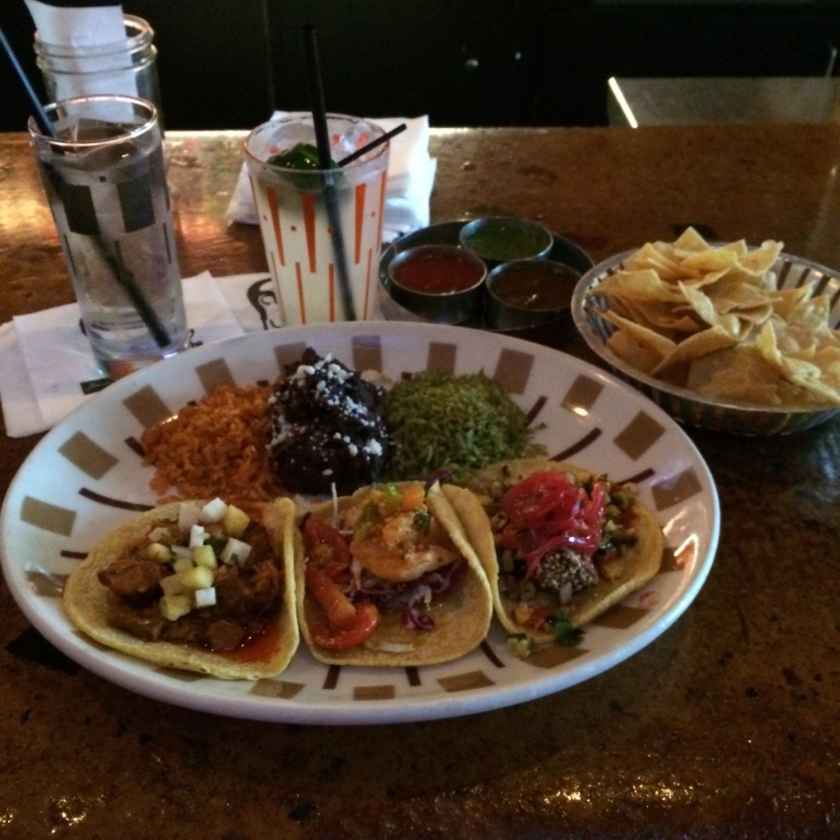 Lunch at Border Grill. I couldn't decide between the chipotle shrimp, avocado or the al pastor tacos, so Steve gave me one of each! And he made me an excellent cucumber jalapeno margarita! 